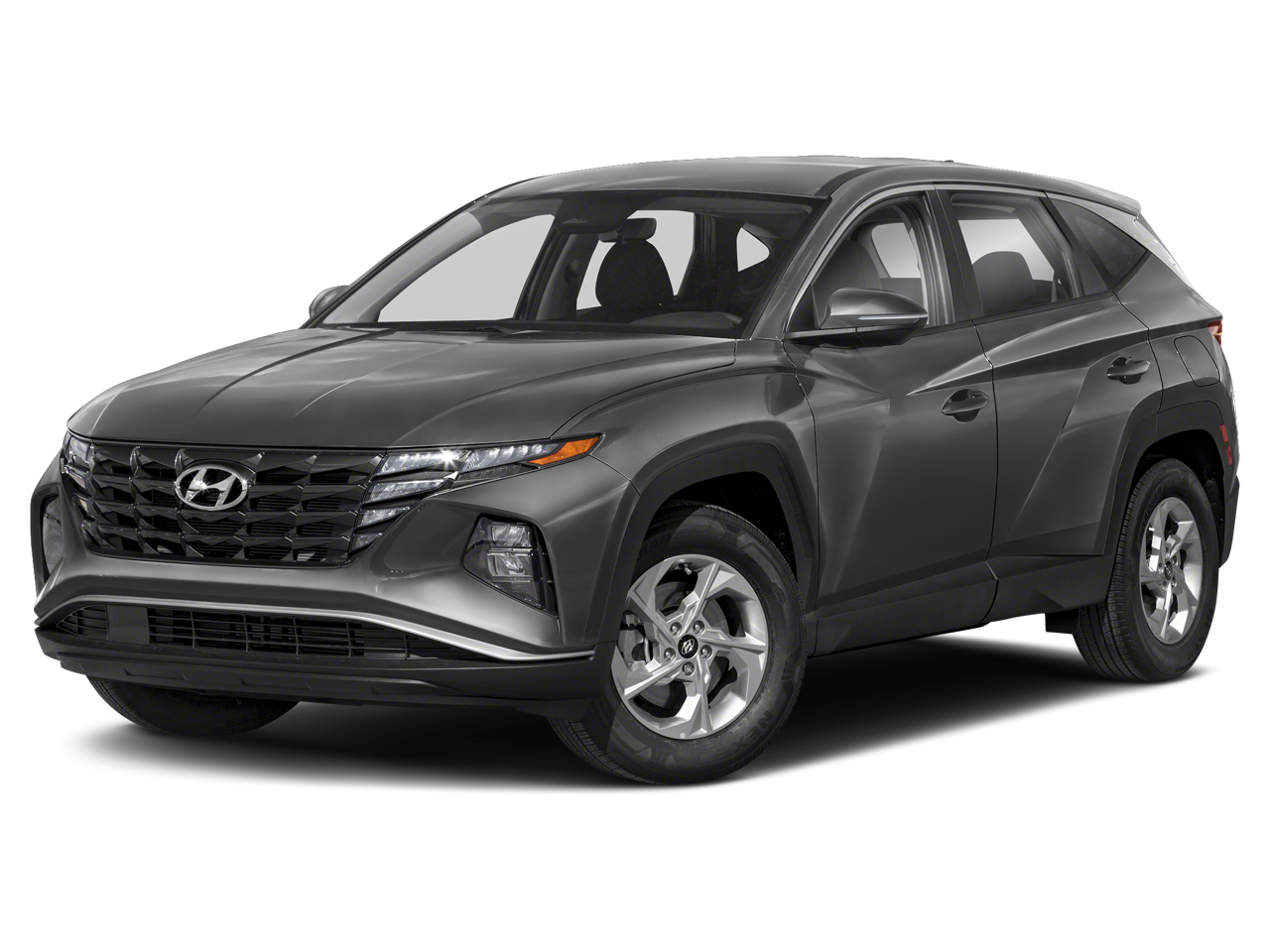 2024 Hyundai TUCSON SE in Hampton Gray — front three-quarter view