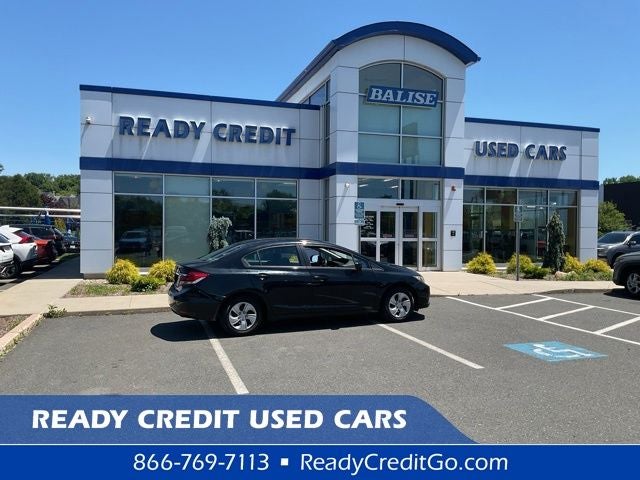 2014 Honda Civic LX in Crystal Black Pearl — front three-quarter view