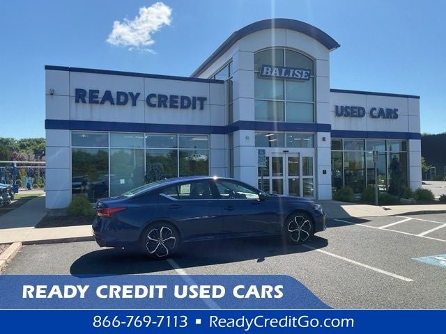 2024 Nissan Altima 2.5 SR in Deep Blue Pearl — front three-quarter view